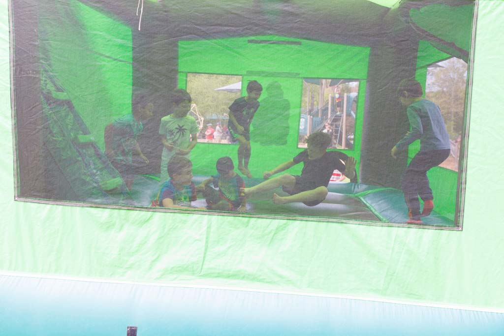children on inflatable