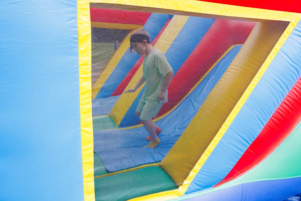children on inflatable