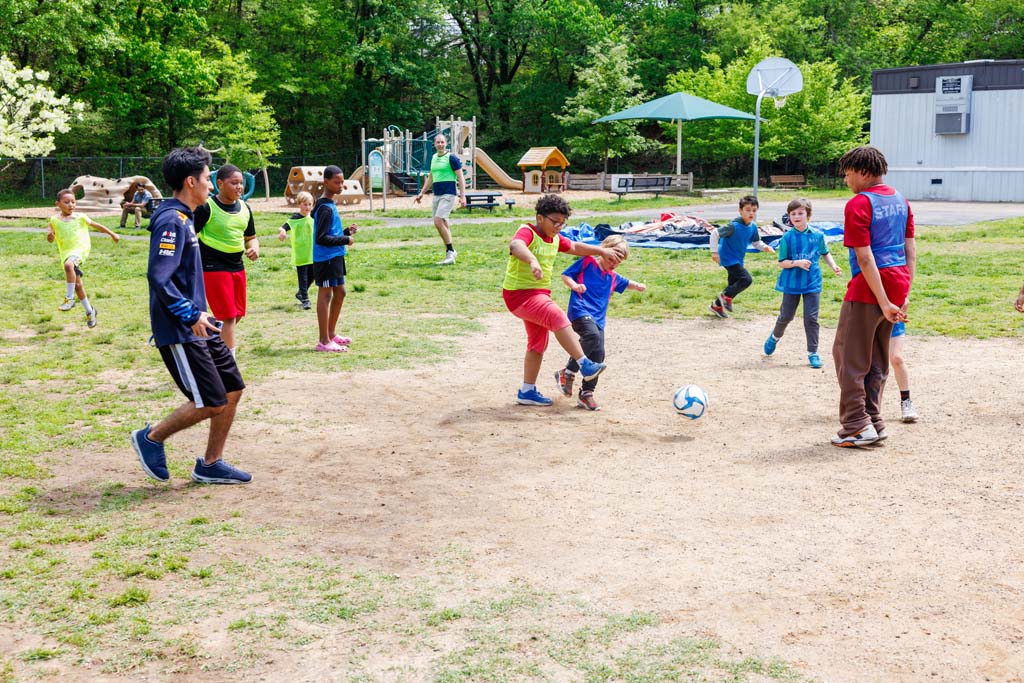 children playing soccer