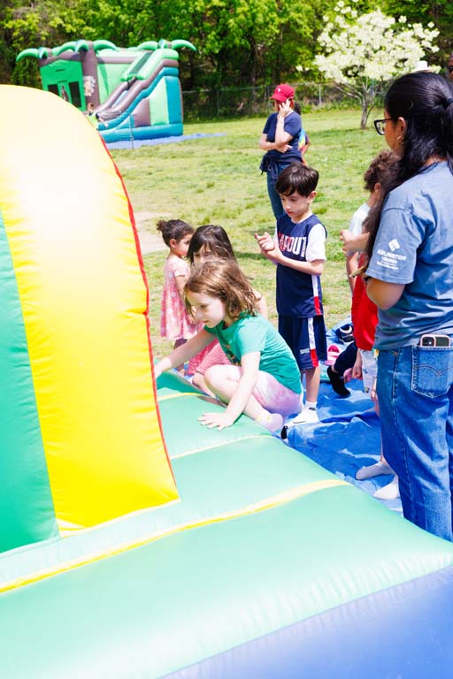 children on inflatable