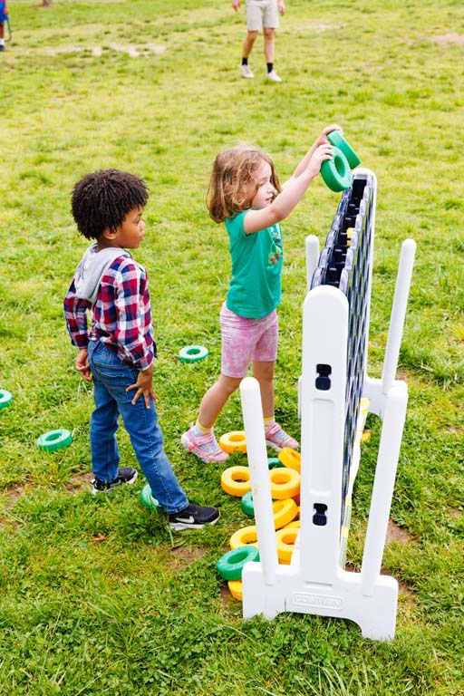 children playing giant Connect 4
