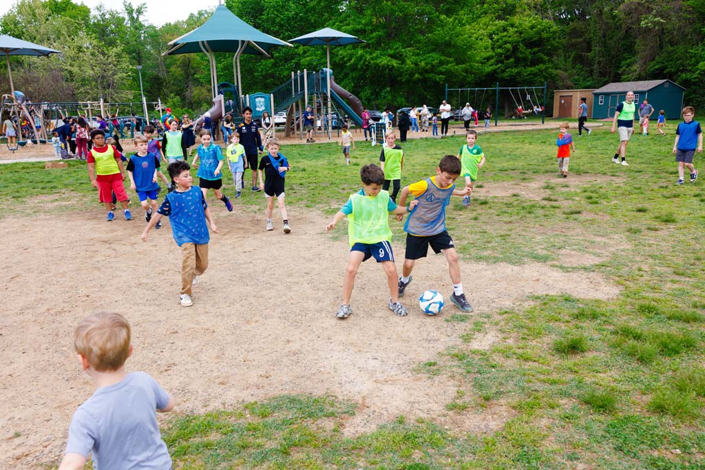children playing soccer