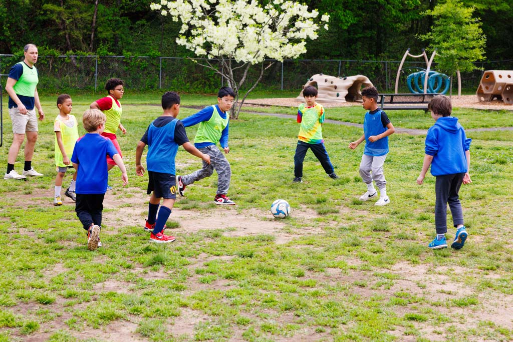 children playing soccer