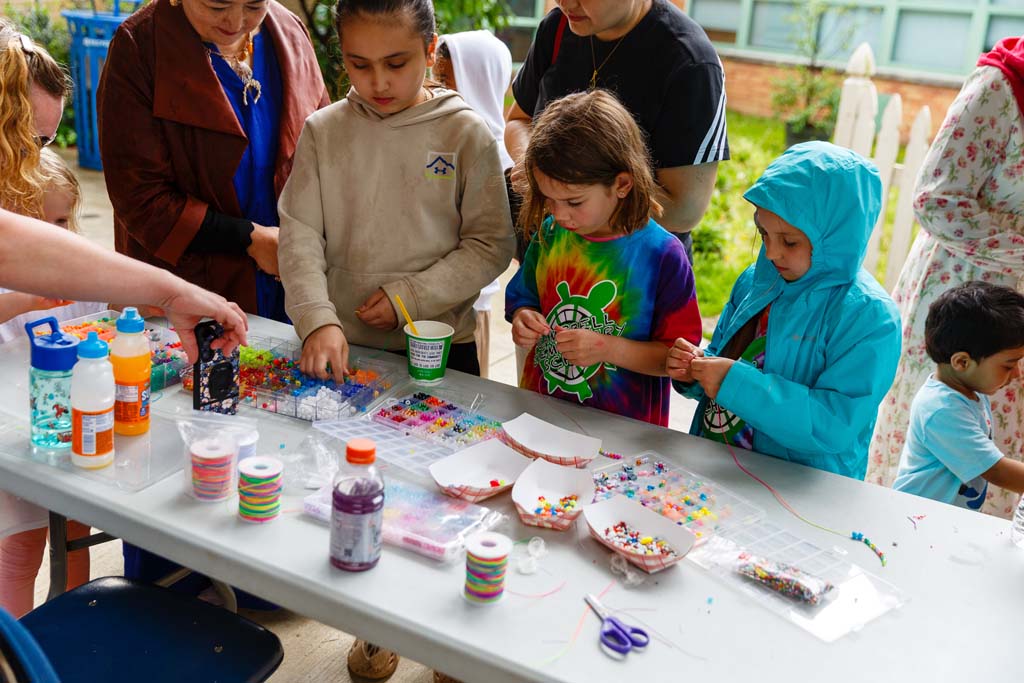 children at beads table