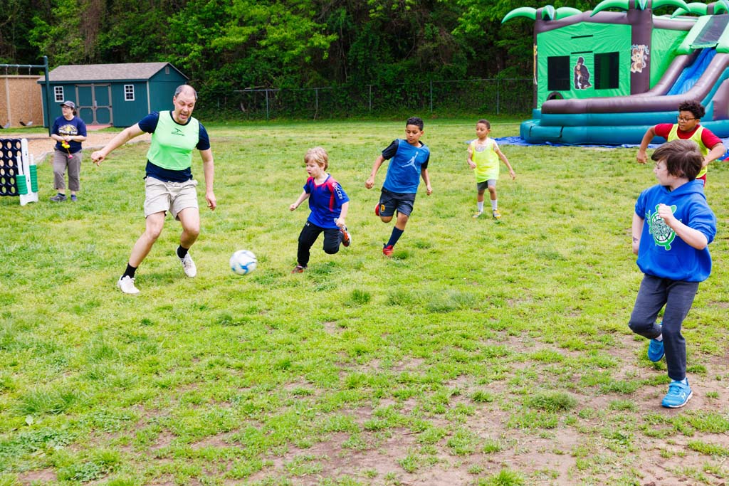 children playing soccer
