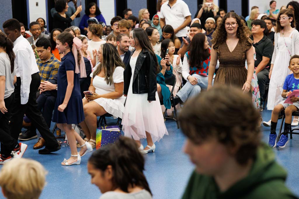 students proceeding into ceremony