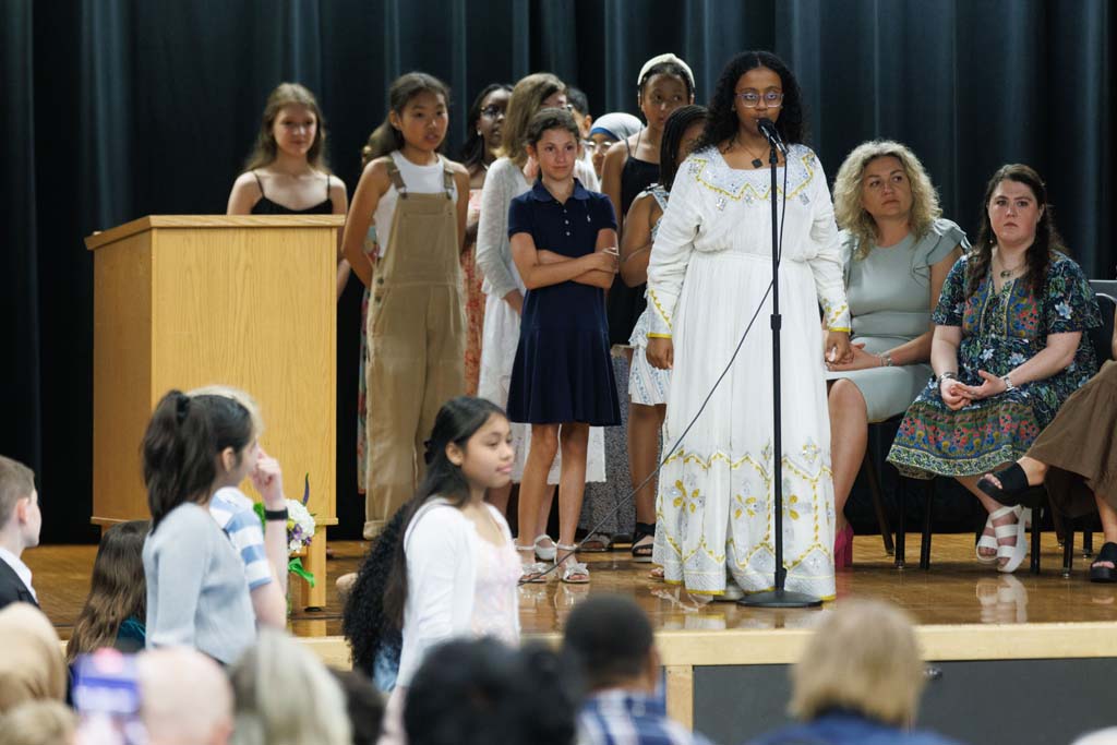 students performing song
