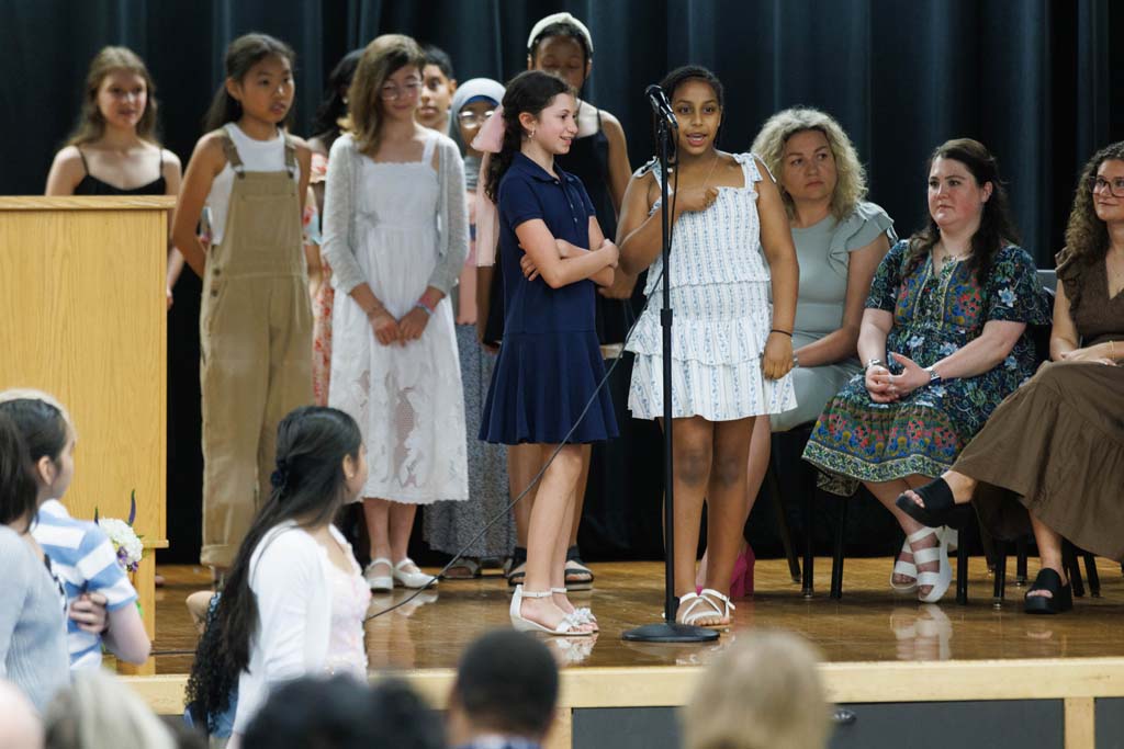 students performing song