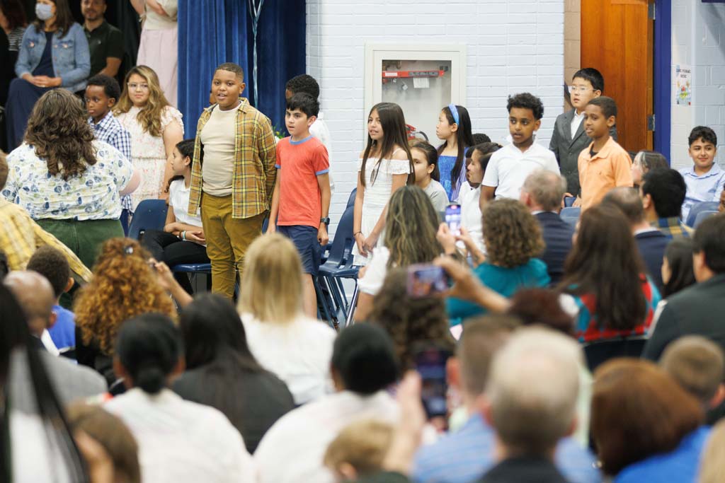 students performing song