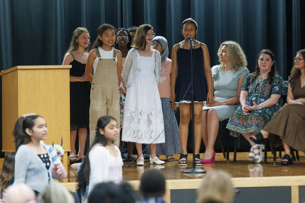 students performing song