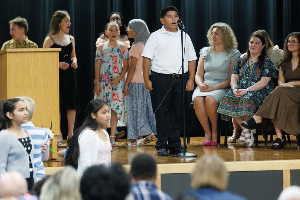students performing song