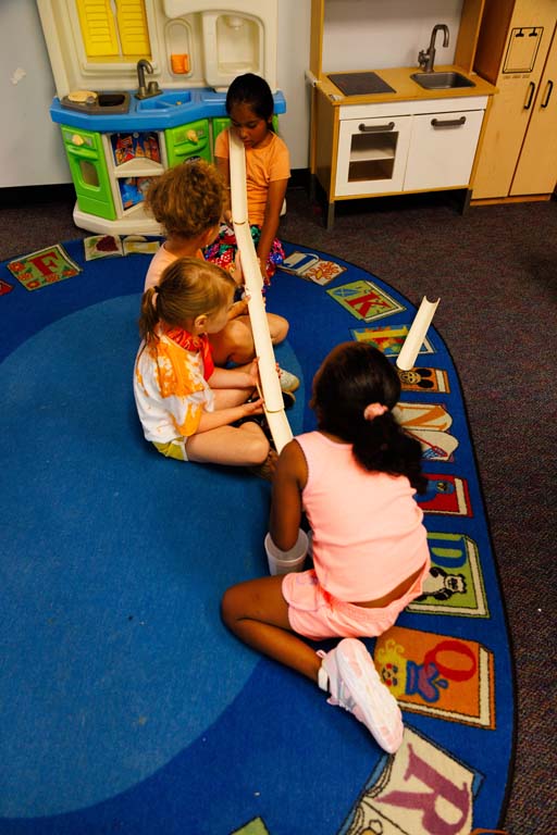 students playing in hallway
