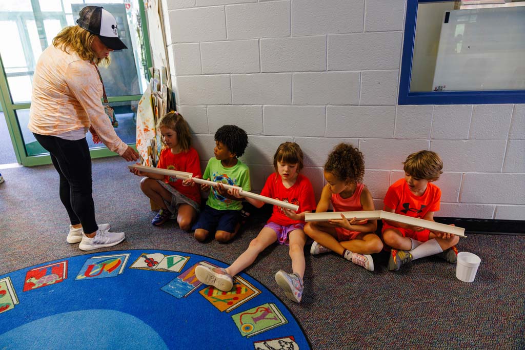 students playing in hallway