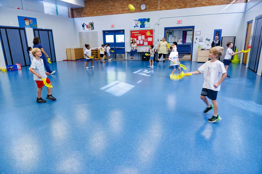 students playing in gym
