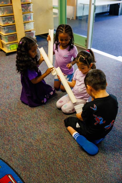 students playing in hallway