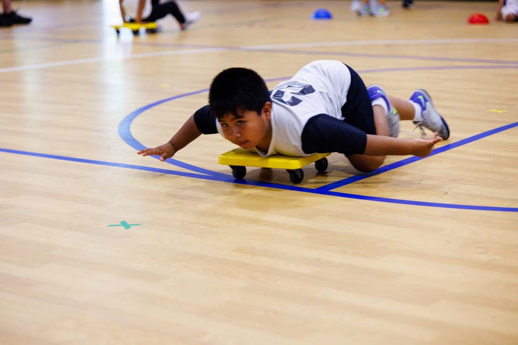 students playing in gym