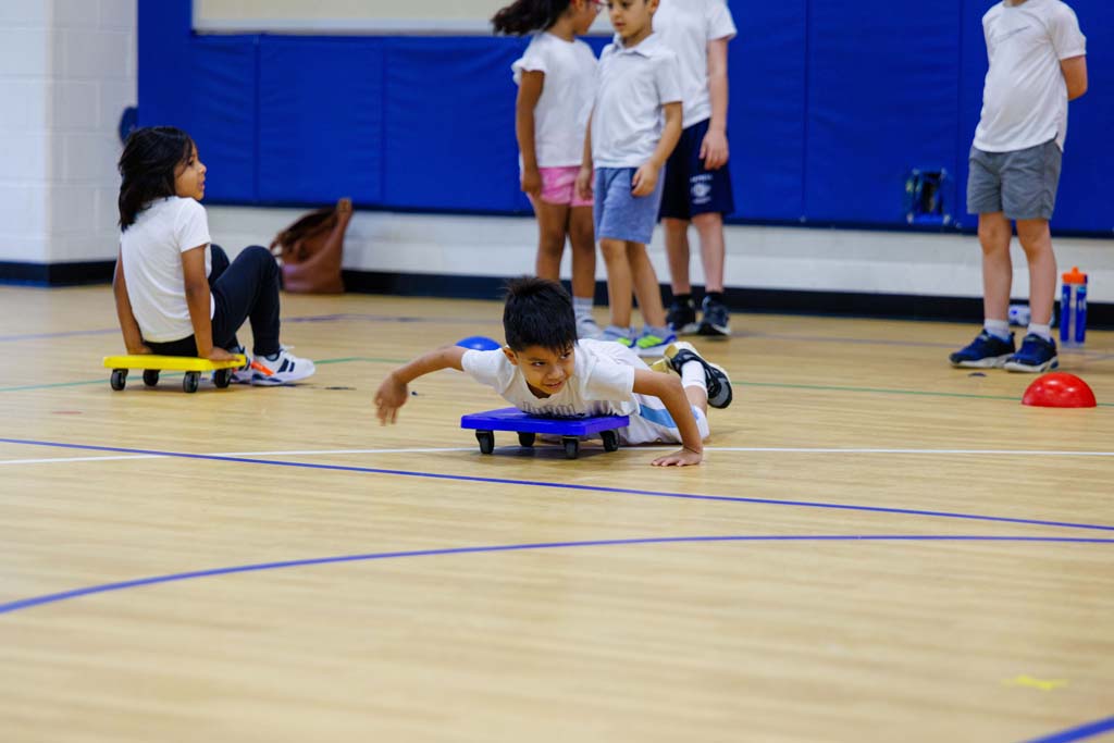 students playing in gym