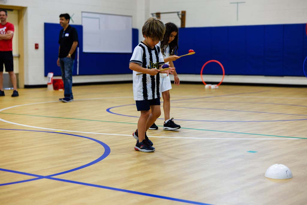 students playing in gym