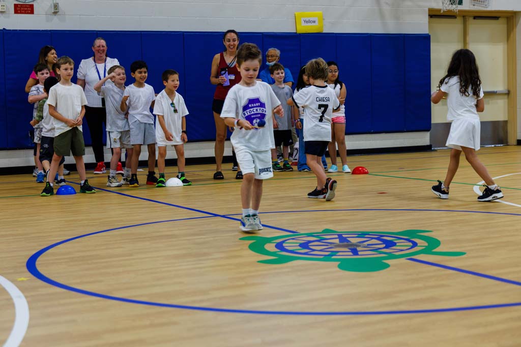 students playing in gym