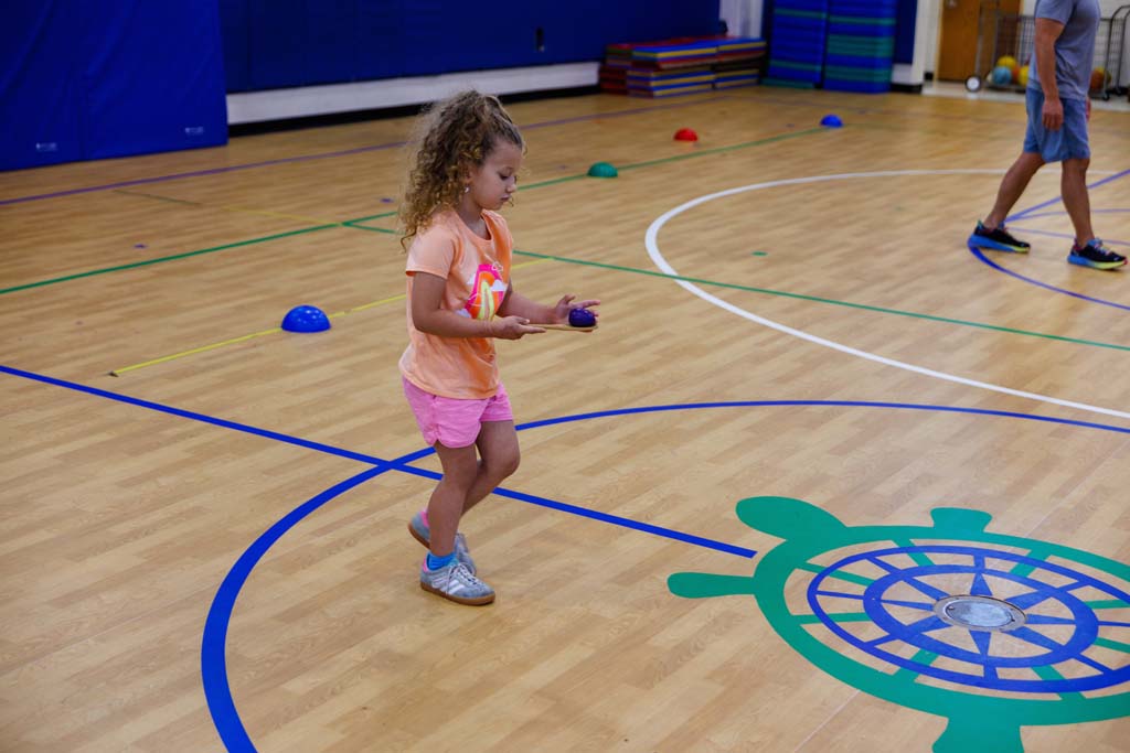 students playing in gym