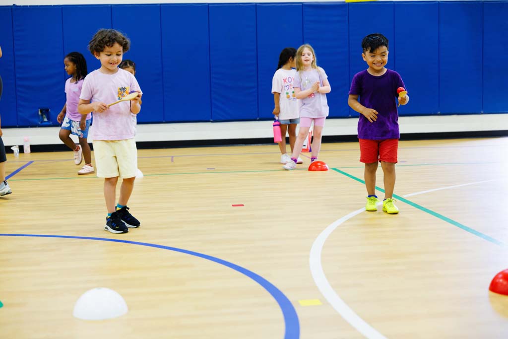 students playing in gym