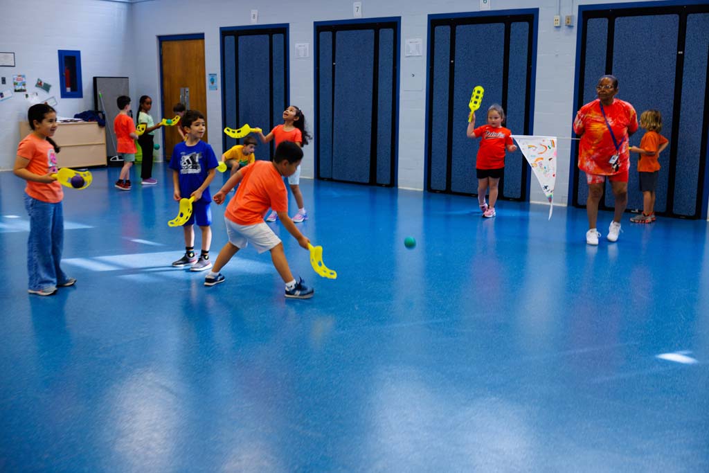 students playing in gym