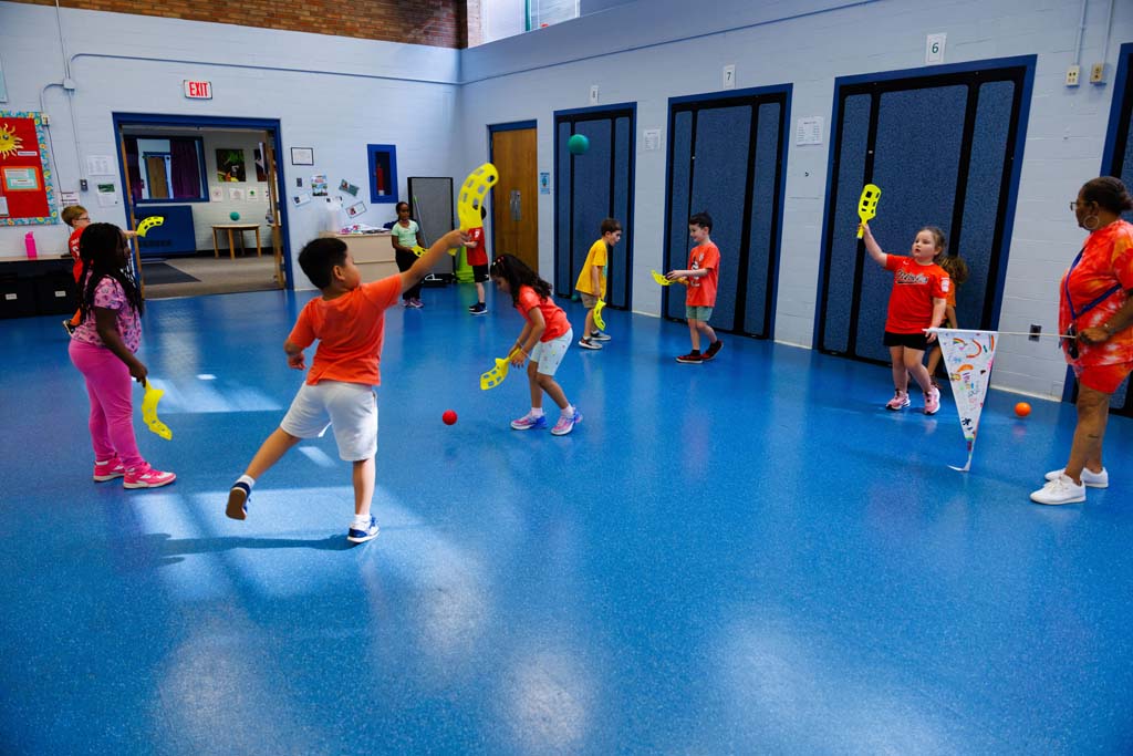 students playing in gym