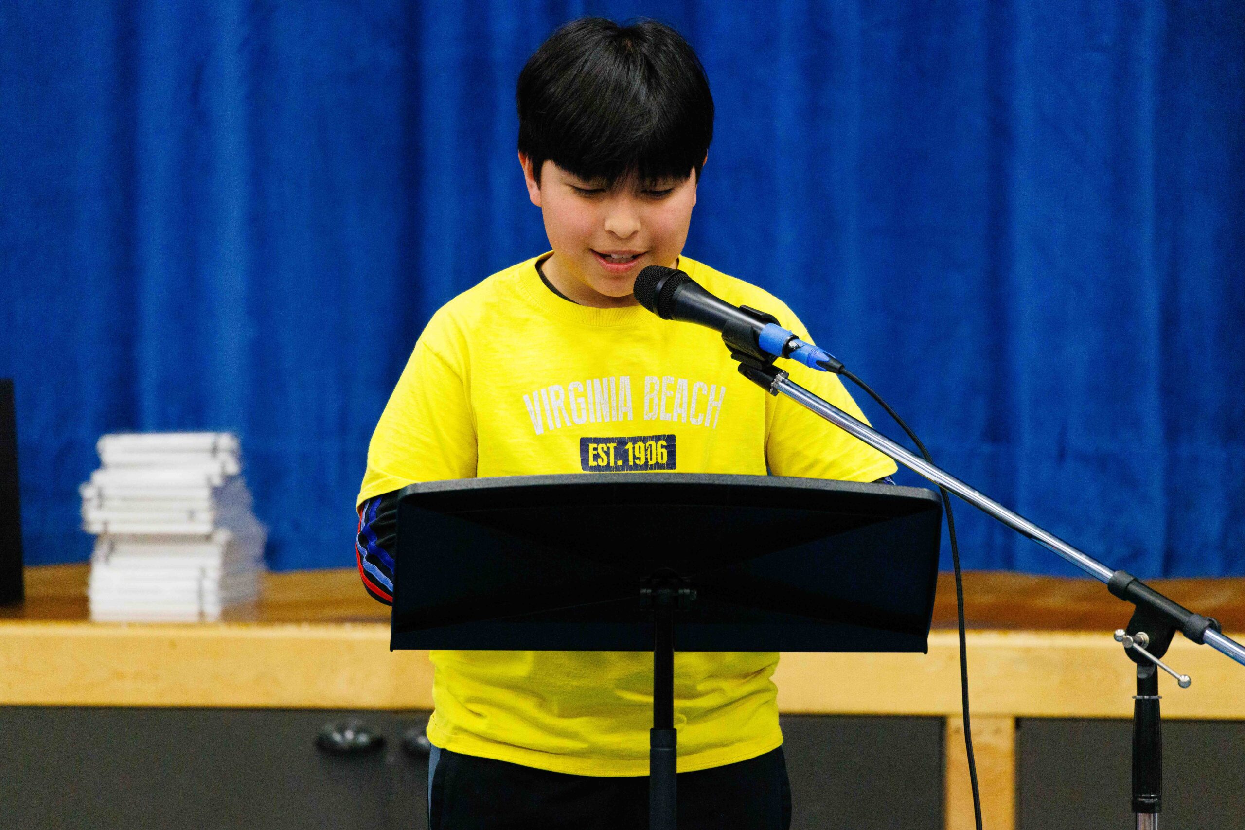 student reciting poetry