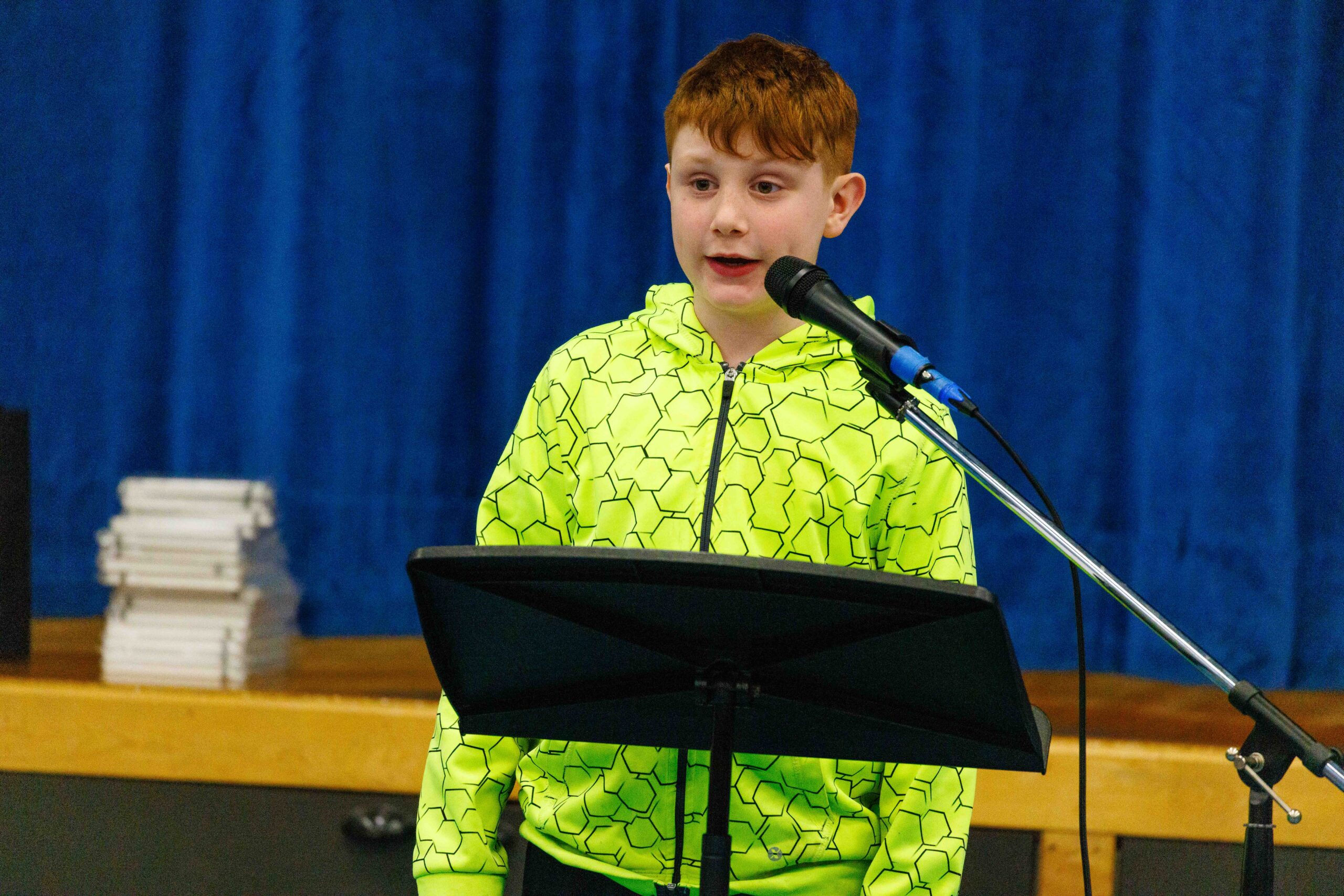 student reciting poetry