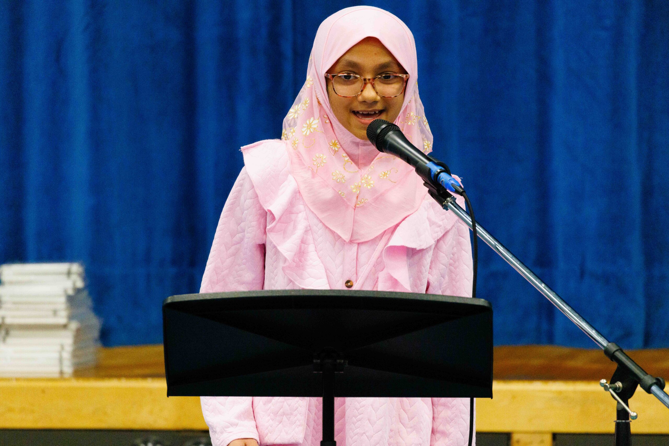 student reciting poetry