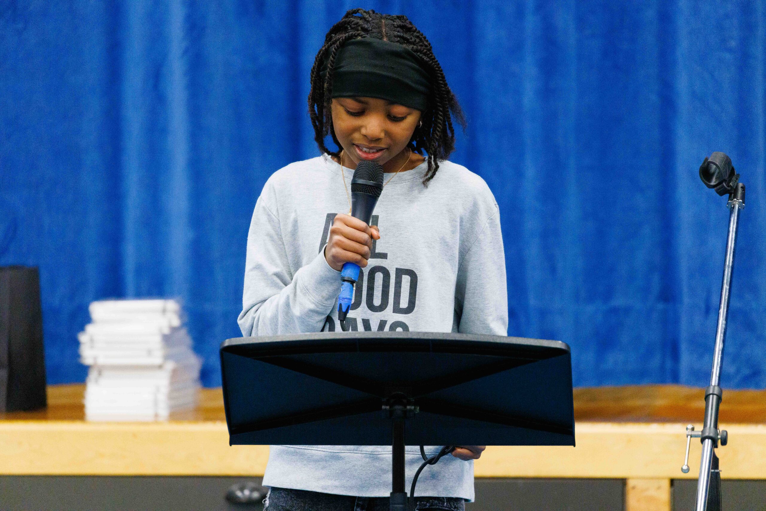 student reciting poetry