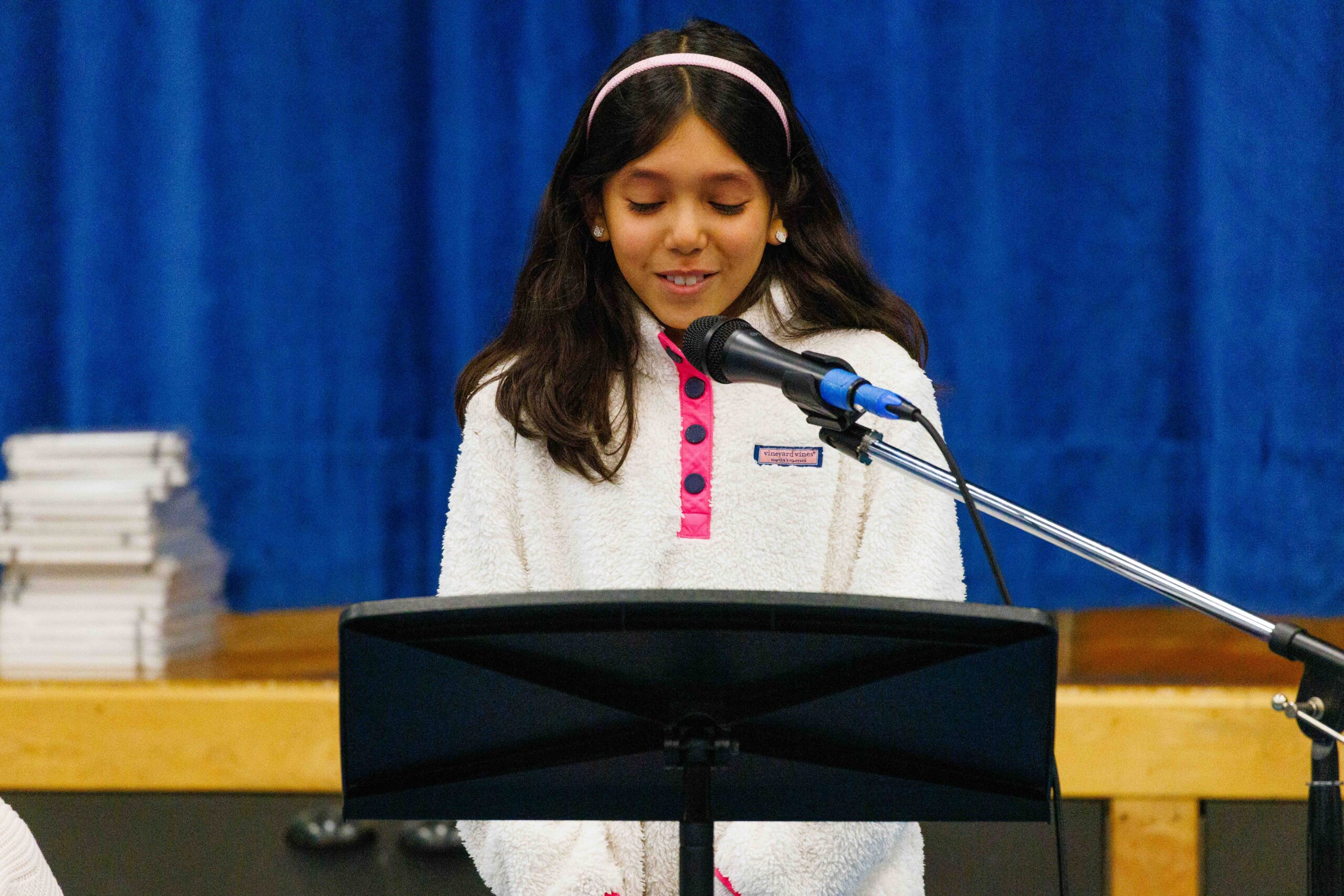 student reciting poetry