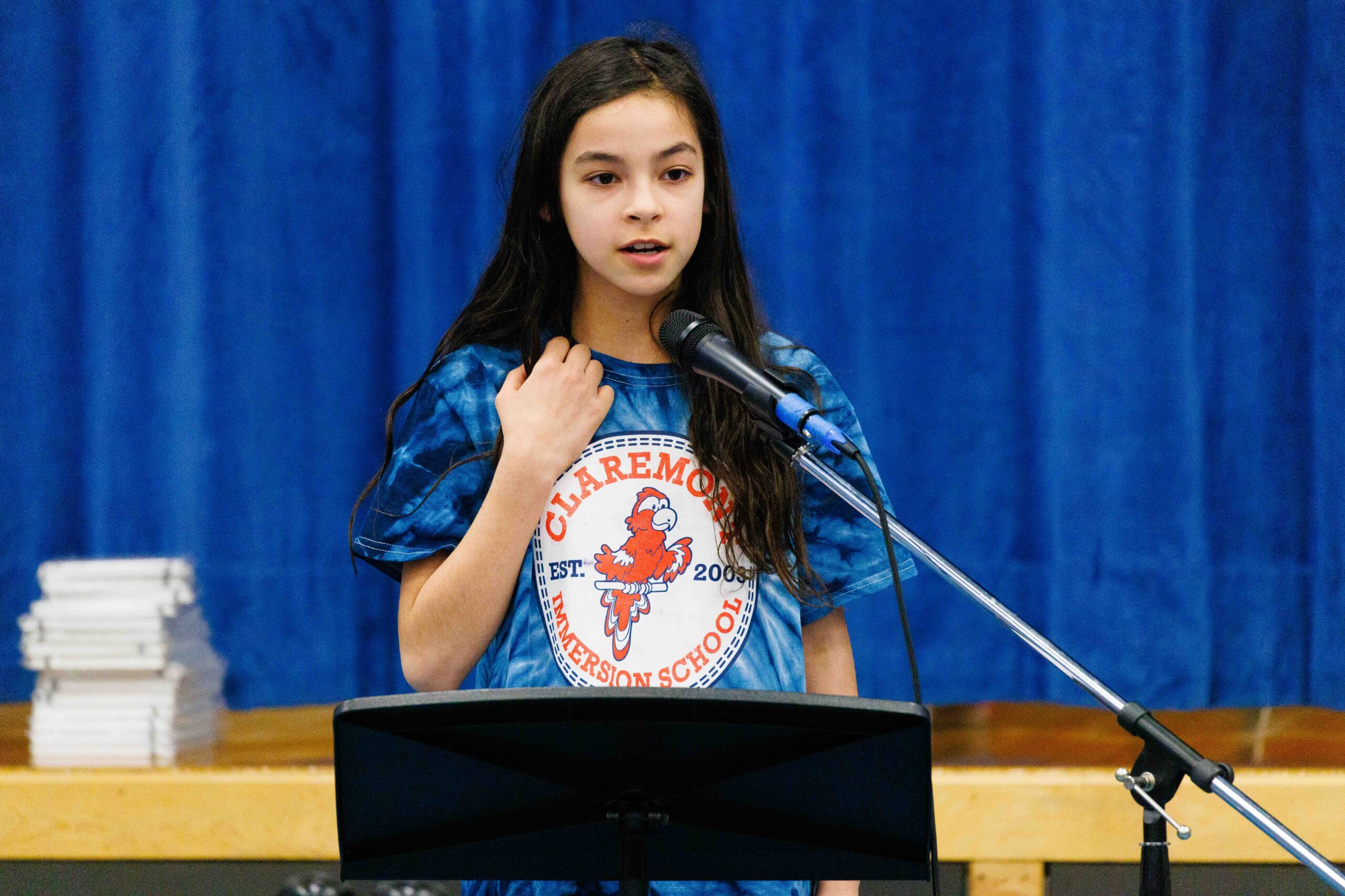 student reciting poetry