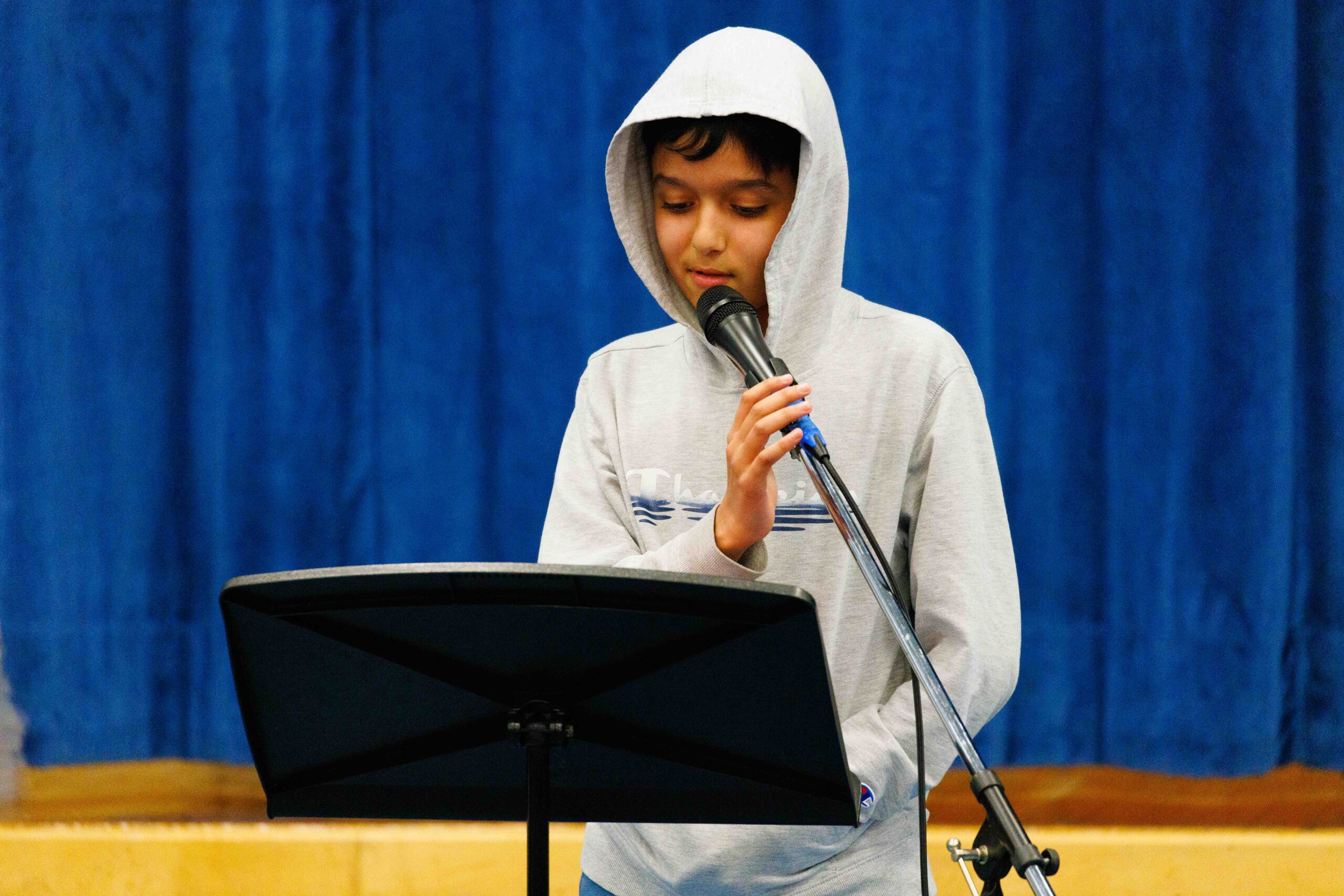 student reciting poetry