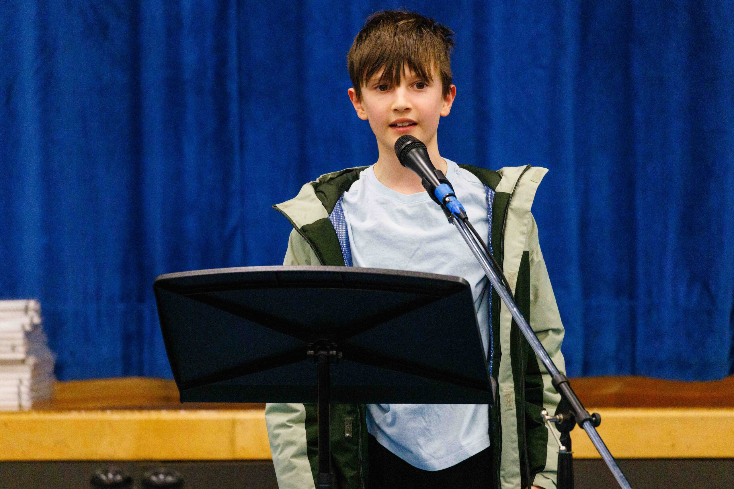 student reciting poetry